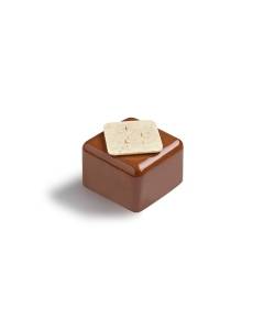 La Maison du Chocolat Walnut and Vanilla Carré on a white background