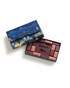 Coffret Joyeuses Fêtes Vents de Noël 16 chocolats semi-ouvert sur un fond blanc