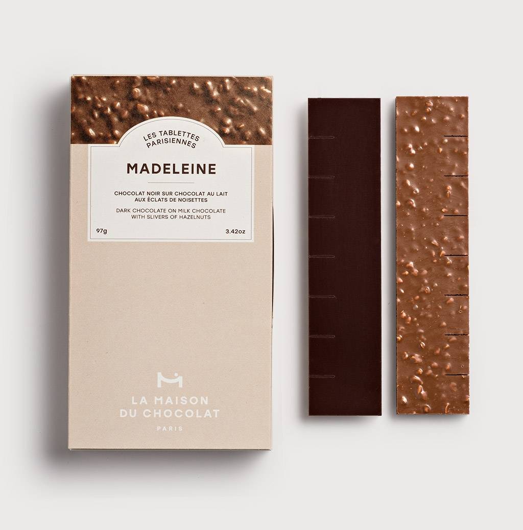 Madeleine Chocolate Bar on gray background 