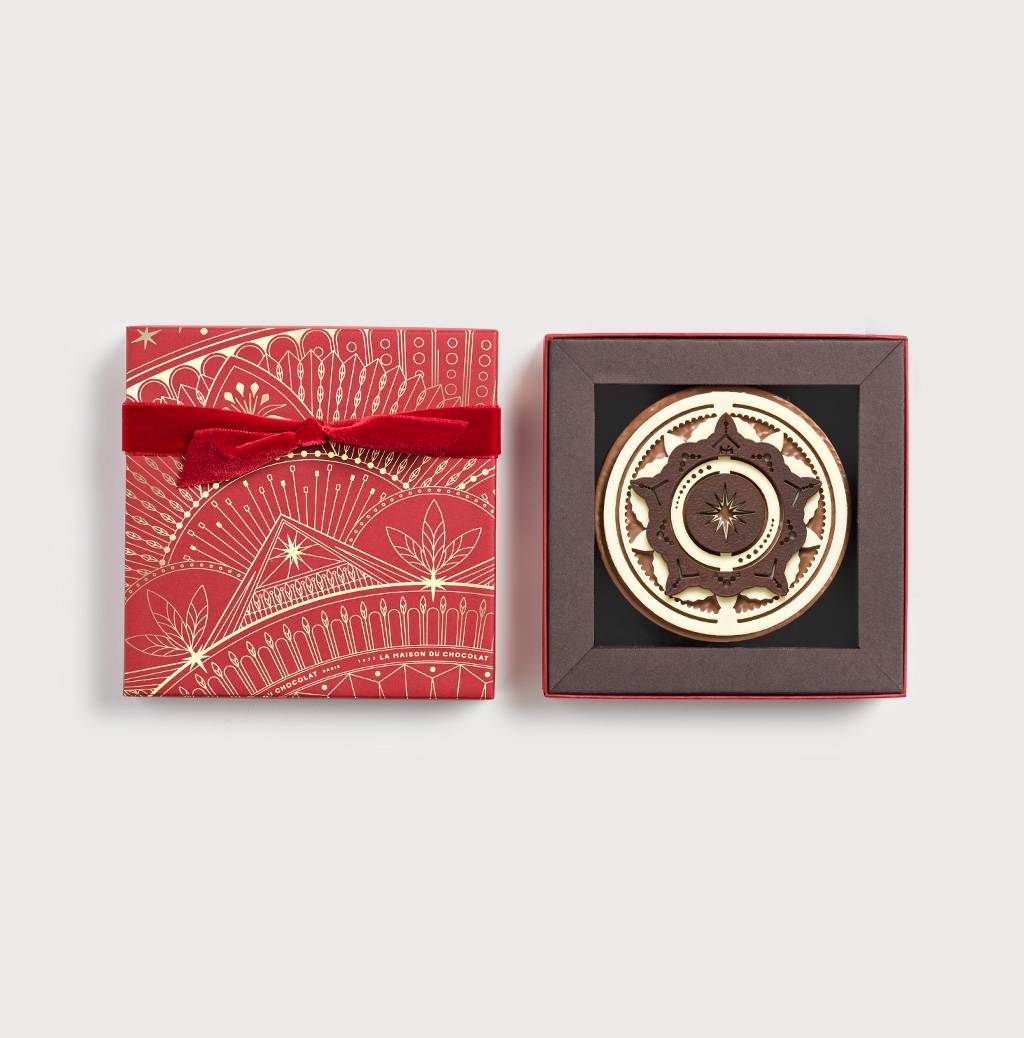 Chocolate Bouchée Christmas Star on grey background