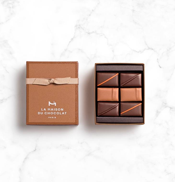 6 chocolates praline box on marble base 