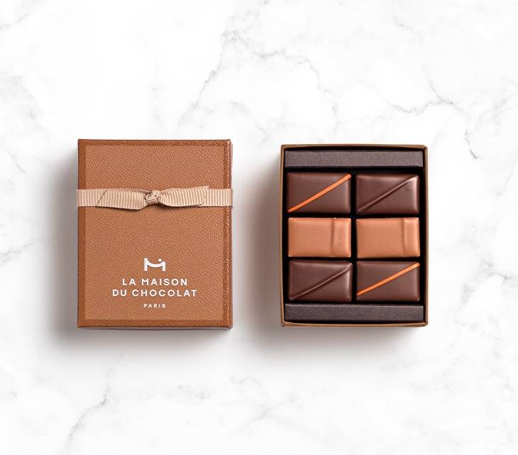 6 chocolates praline box on marble base
