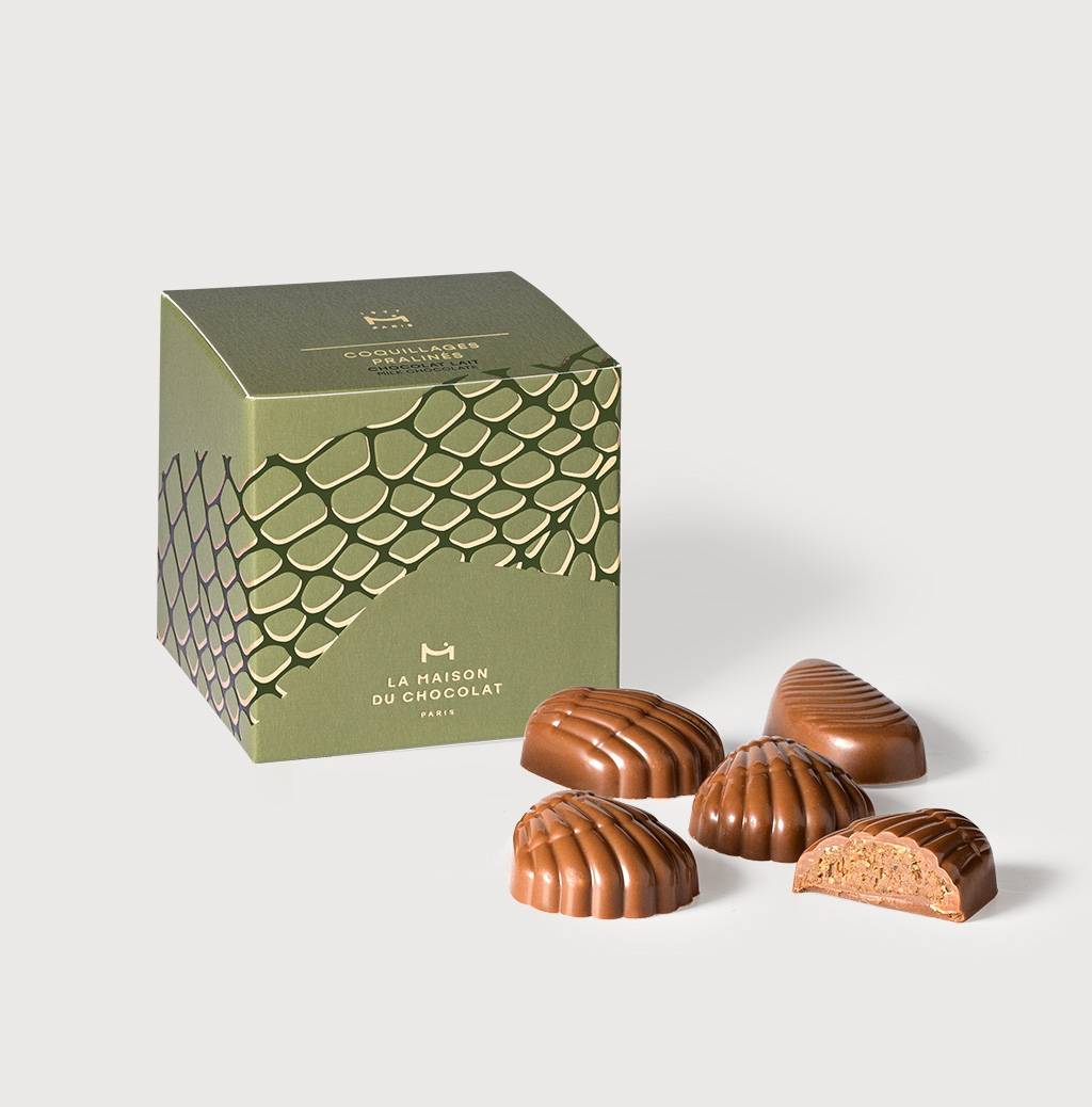 Milk Praliné Treat Gift box in grey background