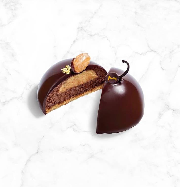 Traviata Entremet Small on a marble background
