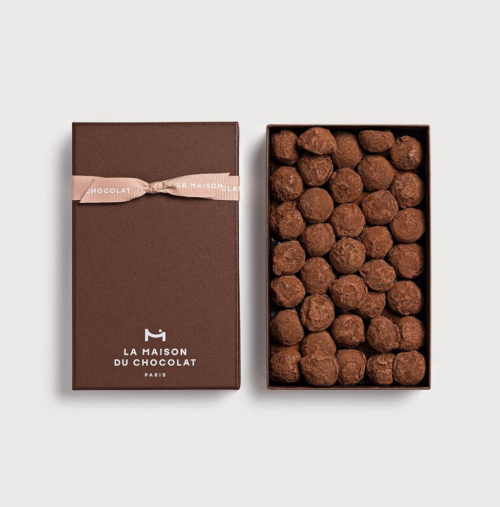 Cognac Truffles Gift Box 245g on grey background
