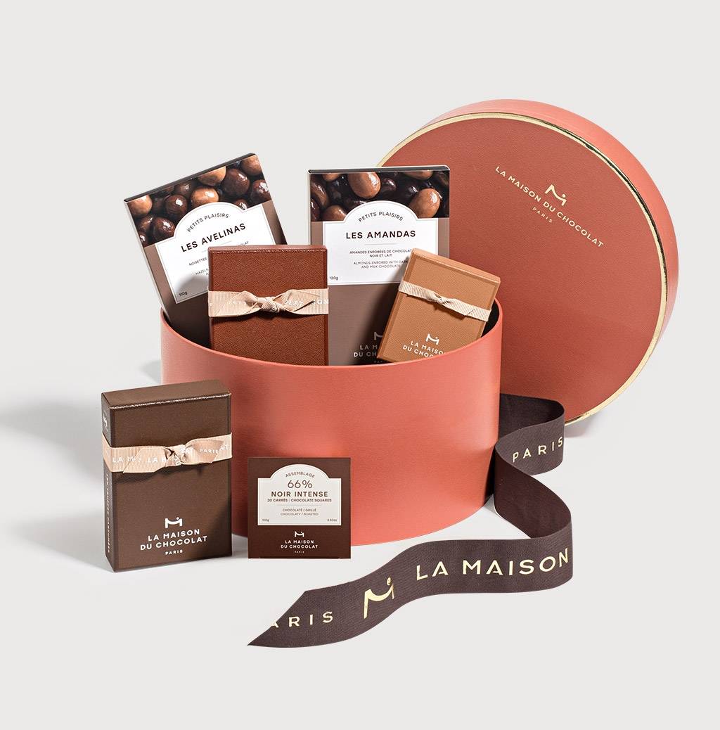 Open Maracuja chocolates gift box on a grey background