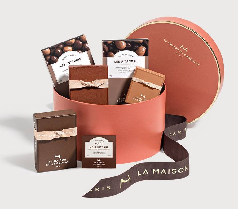 Open Maracuja chocolates gift box on a grey background