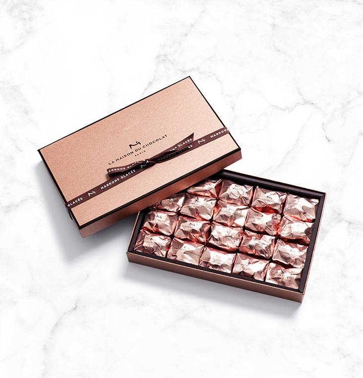 Marron Glacé 20 Pieces on a marble background