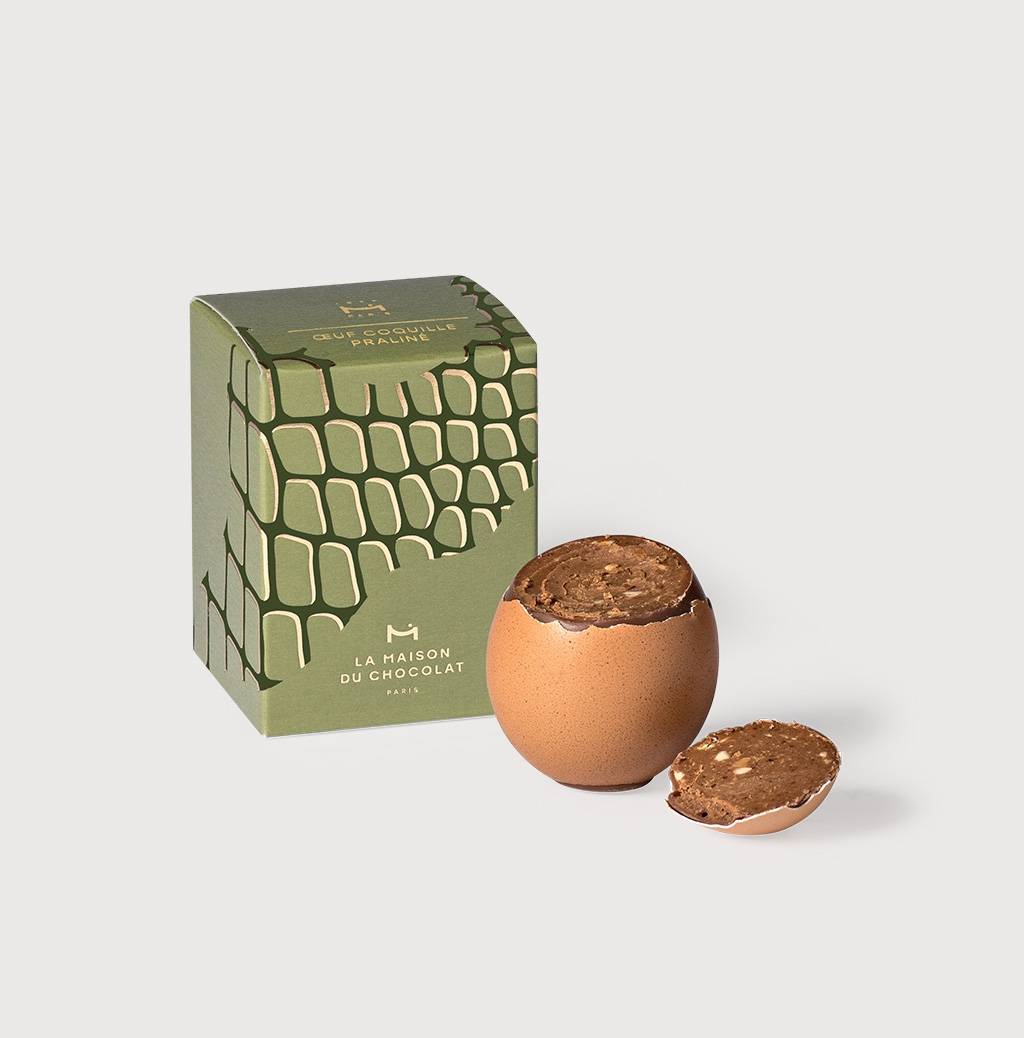 Praliné Easter Shell Egg on a grey backrgound