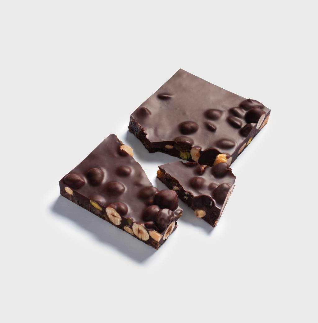 Dark Chocolat Mendiant on a gray background
