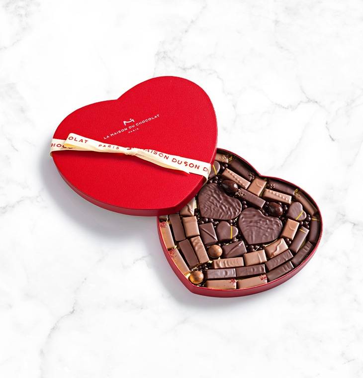 41 chocolates heart giftbox on a marble background