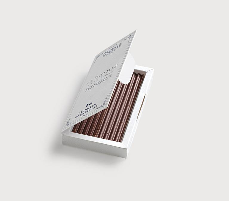 Alchimie Gin Chocolate Bar on gray background