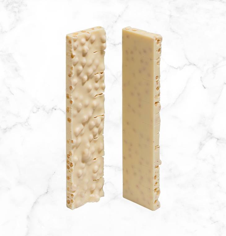 A white chocolate bar with a delicate vanilla flavor, studded with crispy puffed rice. It's a delight for the eyes and a treat for the taste buds in its ice blue box.