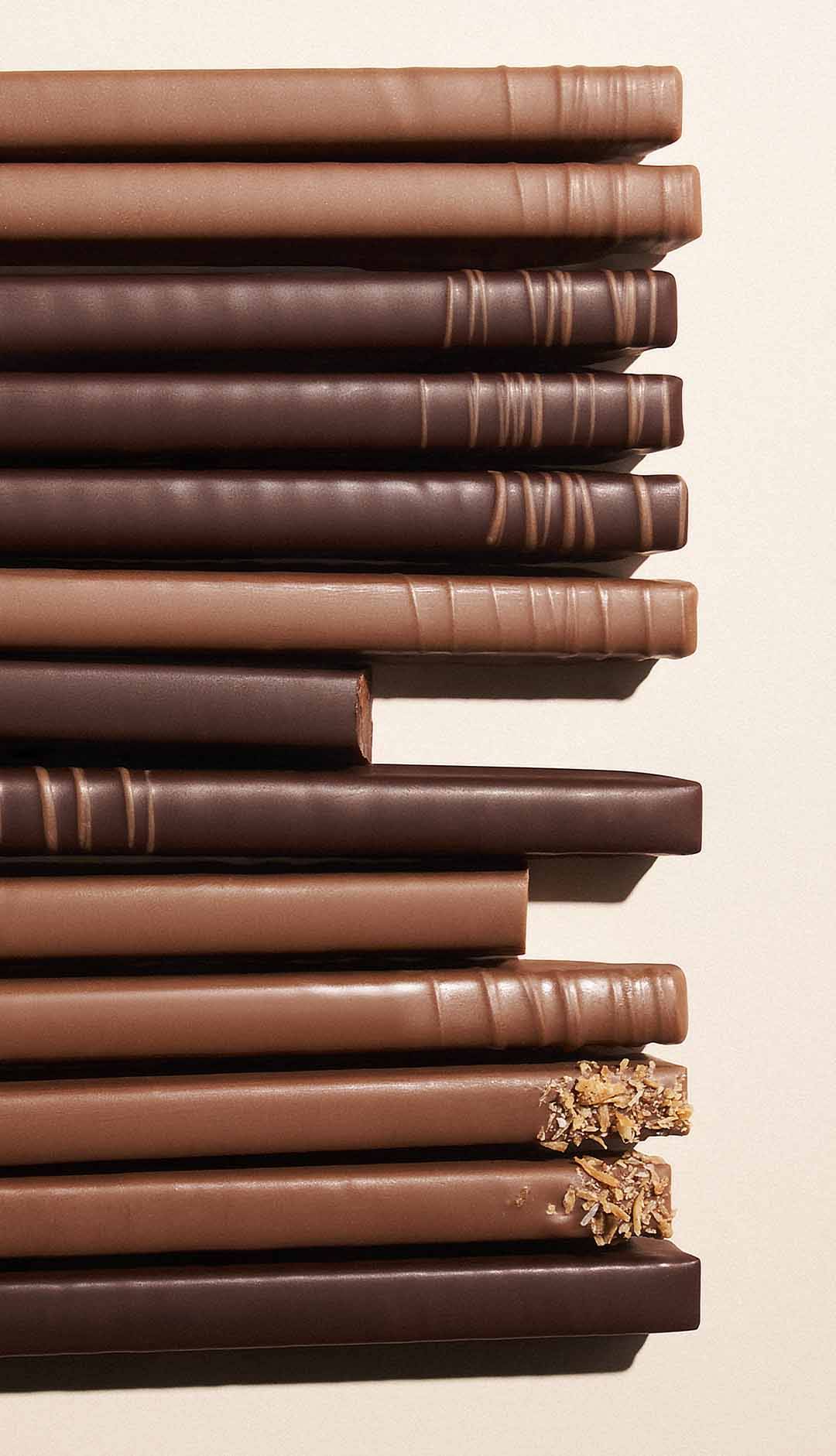 close up photo of assorted chocolate mousse praline 