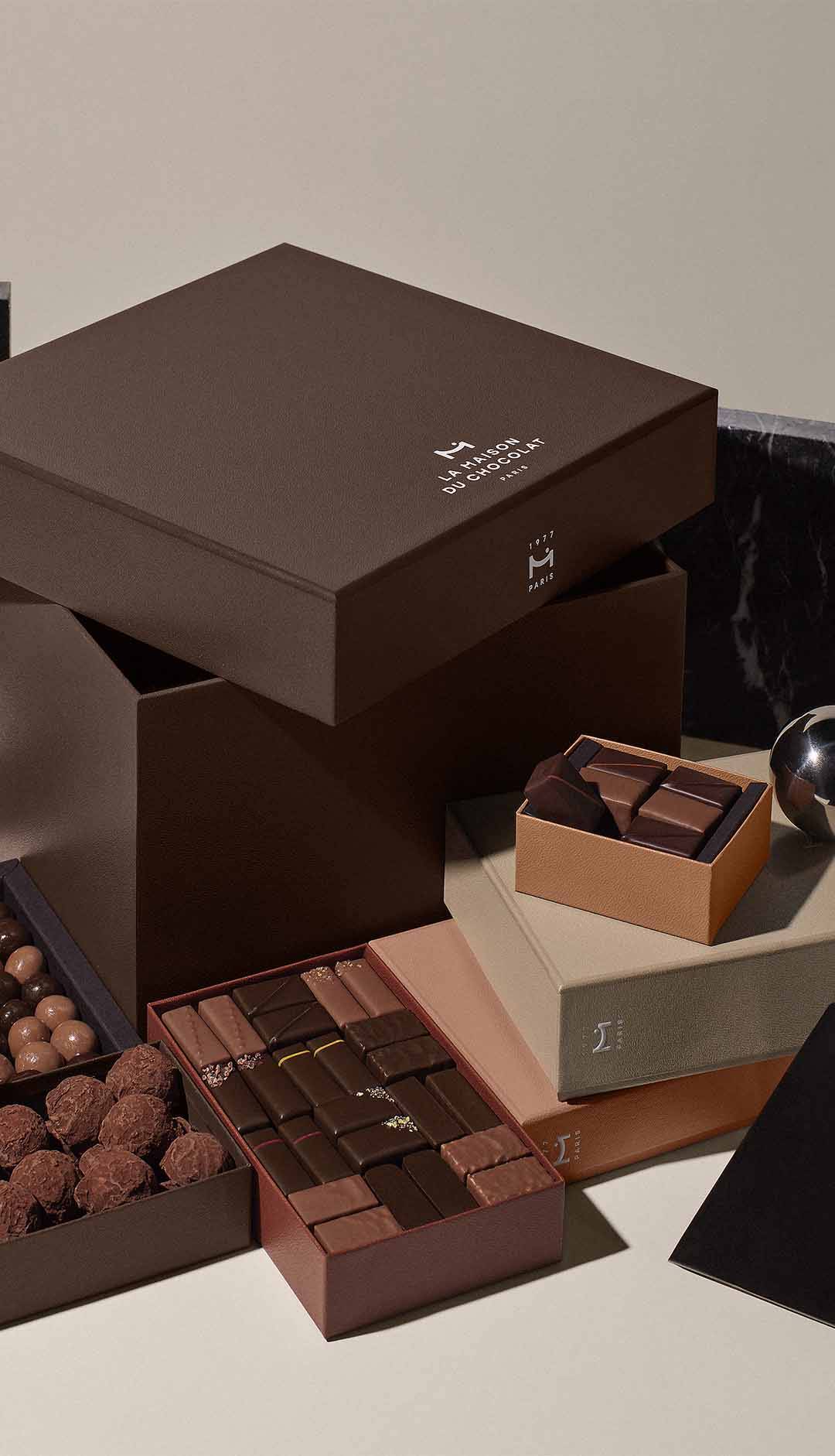 luxurious chocolate gift basket filled with assorted gourmet chocolate gift boxes