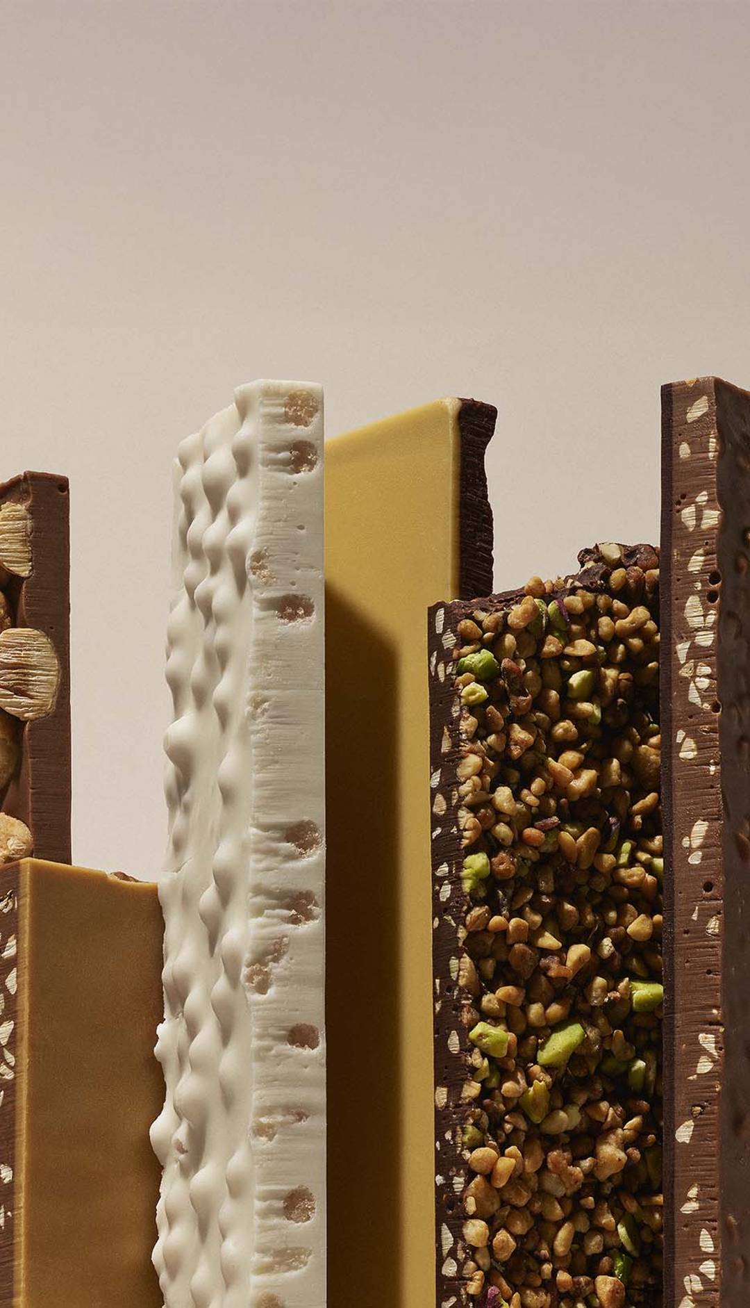close of photo of assorted textured chocolate bars